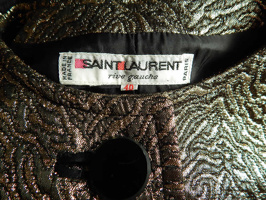 Vintage Saint Laurent Rive Gauche Gold Lam&eacute; Black Knit Suit Jacket
There is a "Saint Laurent Rive Gauche Paris Made in France" designer label European size 40 tag sewn inside.