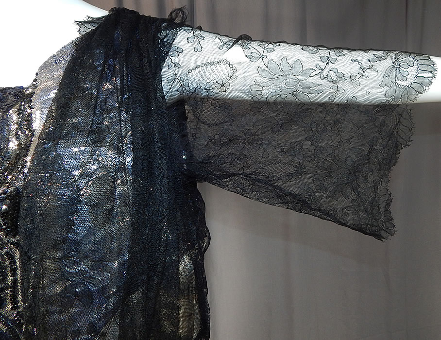 Vintage Art Deco Silver Lam&eacute; Lame Black Chantilly Lace Sequin Beaded Gown
It is made of a silver lam&eacute; silk damask floral weave pattern brocade fabric lining, with a sheer fine black Chantilly lace fabric overlay attached overdress.