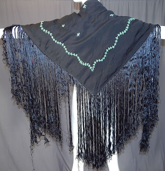 Vintage Black Silk Floral Garland Rosette Yarn Embroidered Fringe Shawl Scarf
This gorgeous garland rosette shawl has a triangle shape, with hand knotted black silk fringe trim along the sides, bottom and the top has none. It is embroidered on both sides making it reversible.