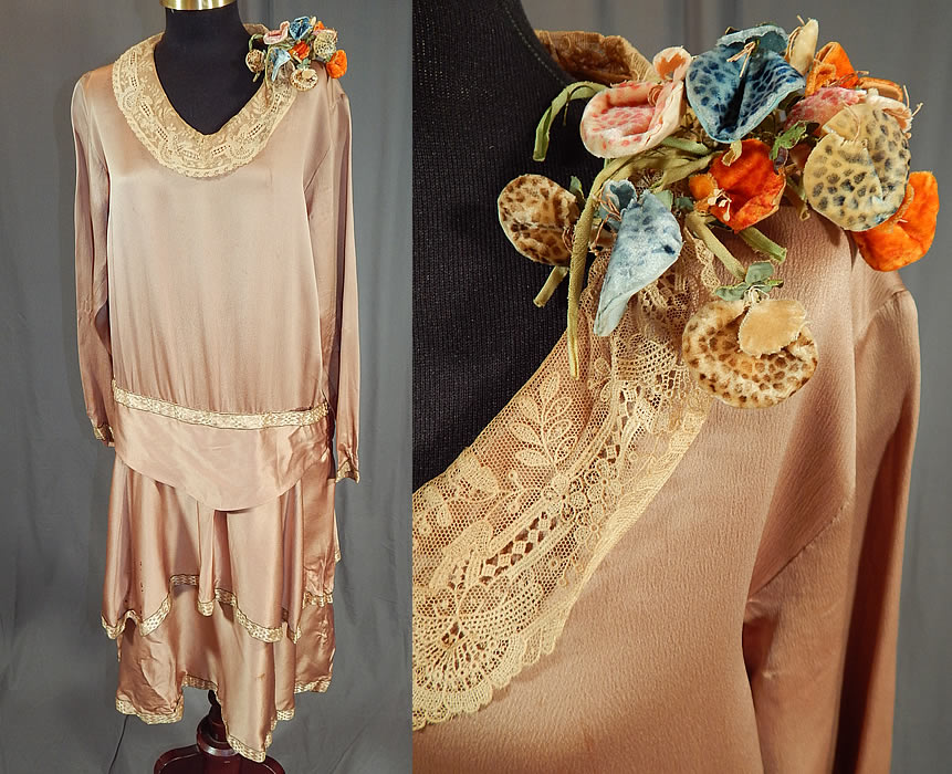 Vintage Ecru Beige Silk Lace Collar Spotted Velvet Flower Trim Drop Waist Dress
This vintage ecru beige silk lace collar spotted velvet flower trim drop waist dress dates from the 1920s. It is made of an ecru beige color silk fabric, with a cream colored lace collar, gold lam&eacute; trim edging around the waist, skirt, sleeve cuffs and an unusual colorful spotted velvet flower bouquet trim on the shoulder. 