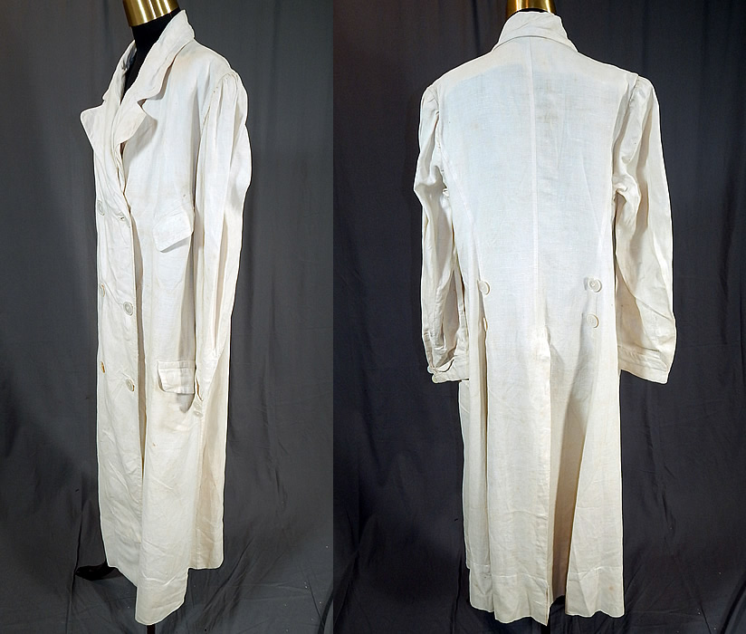 Edwardian Women's White Linen Double Breasted Motoring Driving Duster Coat
This wonderful women's double breasted duster motoring coat is loose fitting, a long floor length, with a kick pleat slit back skirt, fold over wide lapel collar, three front flap pockets, gathered shoulders, long full sleeves with buttoned rolled cuffs, mother of pearl buttons on the back for decoration and down the front for closure and is unlined.