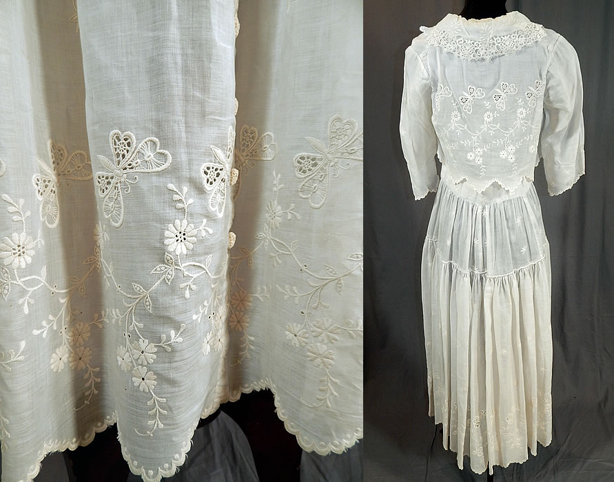Edwardian White Cotton Batiste Embroidered Eyelet Butterfly Lace Dress
This beautiful butterfly summer white dress is a long tea length, with an attached cropped short overblouse, fold over scalloped collar, a lace trim net camisole dickey front insert, 3/4 length sleeves, square crochet covered button trim accents, a fitted waistband with blue silk ribbon bow trim on front, hook, snap closures down the front and is sheer, unlined. 