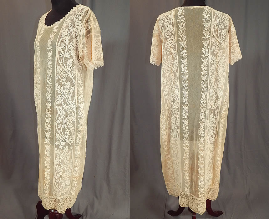 Vintage Embroidered Cream Net Filet Lace Drop Waist Chemise Shift Dress
This lovely lace chemise style shift dress is loose fitting, has a drop waist, short sleeves and is sheer, unlined. The dress measures 43 inches long, with 38 inch hips, a 38 inch waist and 40 inch bust. 