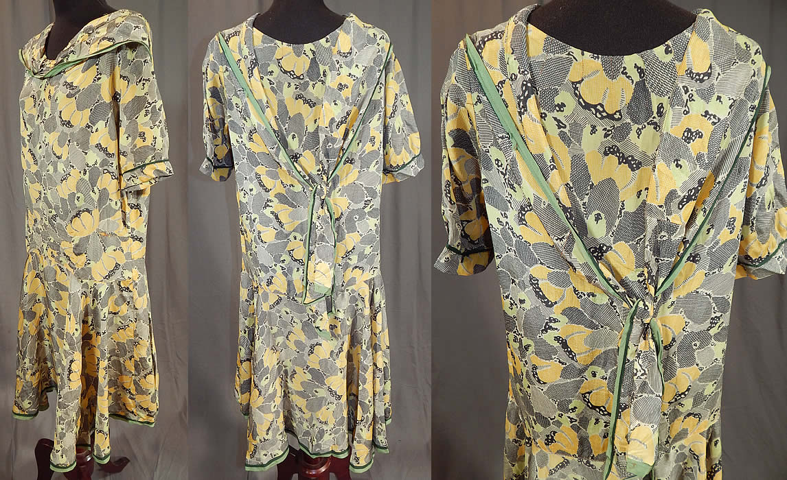 Vintage Black & White Yellow Daisy Print Silk Sailor Collar Drop Waist Dress
This delightful daisy dress has a loose fitting drop waist style, with a short full skirt, sailor collar scarf tie back, short sleeves and is unlined. 