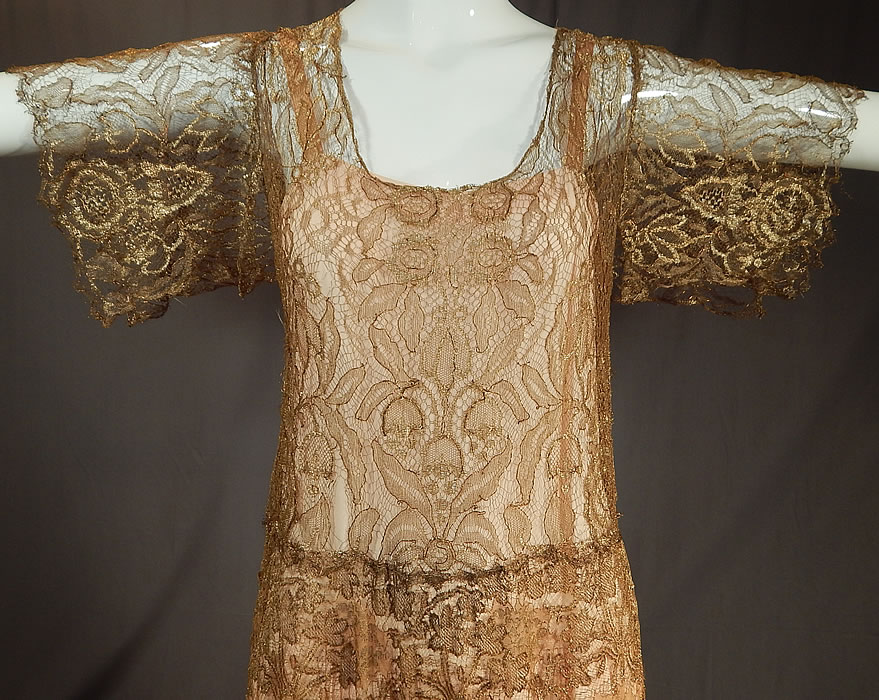 Vintage Gold Metallic Lamé Lame Lace Short Kimono Sleeve Dress & Pink Silk Slip
This gorgeous gold dress is a long mid length, with short kimono style squared sleeves, rounded necklines, no side openings and is sheer, unlined.