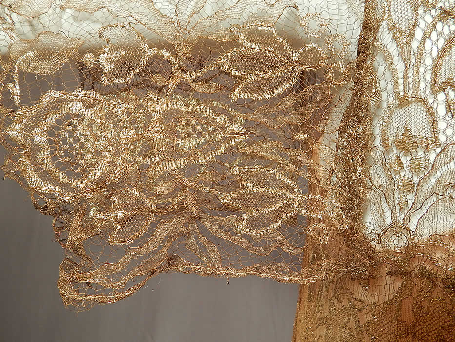 Vintage Gold Metallic Lam&eacute; Lame Lace Short Kimono Sleeve Dress & Pink Silk Slip
The dress is in good condition needing only some minor restoration repair, with two small frays on the front lace top bust area and a 2 inch frayed break in the lace on the bottom front top near the waist (see close-up).