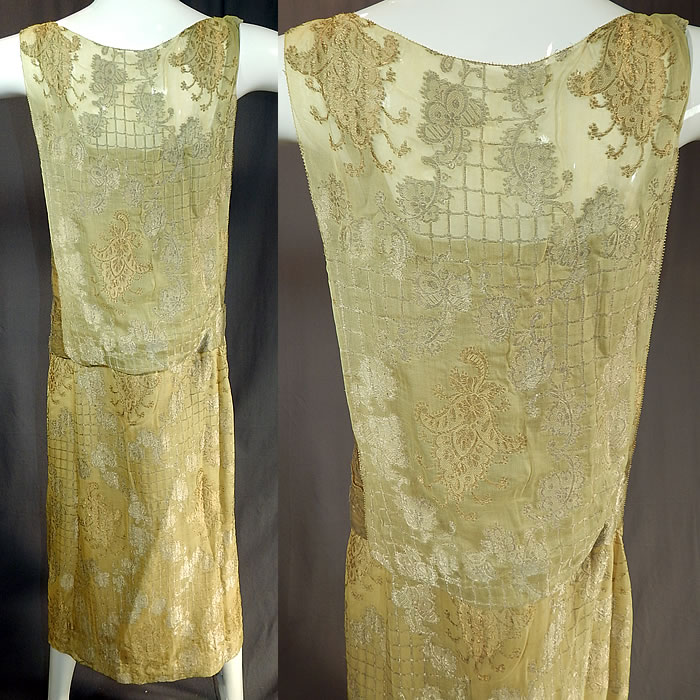 Vintage Art Deco Chartreuse Gold Lam&eacute; Lame Silk Damask Drop Waist Flapper Dress
This fabulous flapper dress has a loose fitting drop waist style, with gold lam&eacute; mesh lined open sides, sleeveless, front snap closures and is fully lined in a chartreuse green silk satin fabric inside. 
