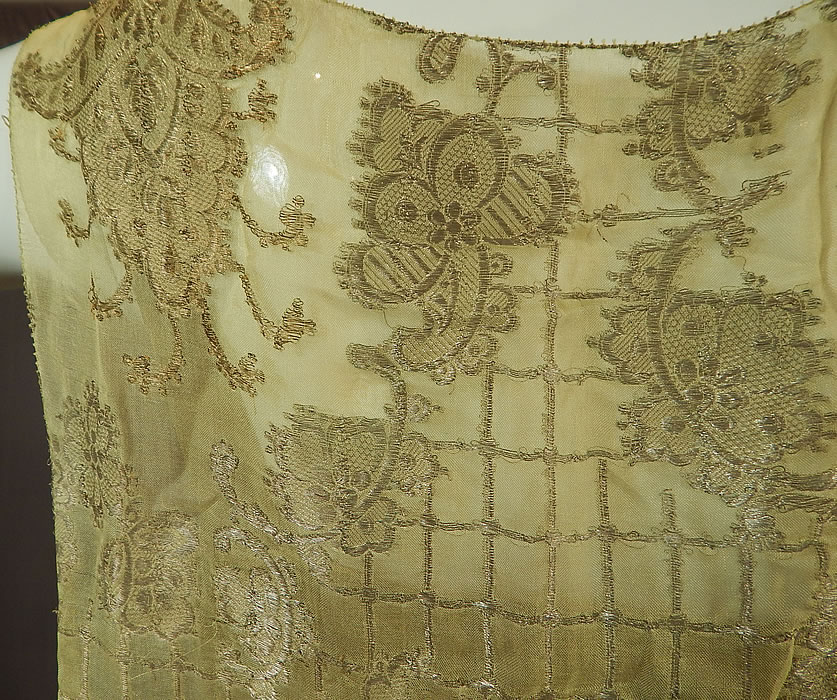 Vintage Art Deco Chartreuse Gold Lam&eacute; Lame Silk Damask Drop Waist Flapper Dress
The dress measures 48 inches long, with 44 inch hips, a 38 inch waist and 36 inch bust. 