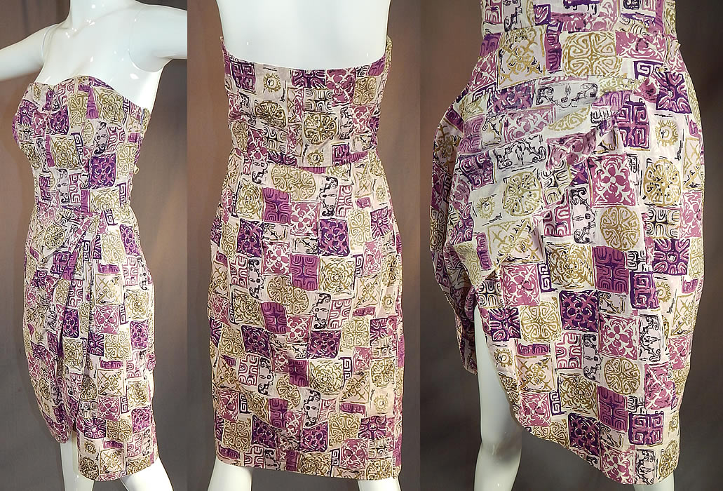 Vintage Purple & Gold Hawaiian Tapa Print Cotton Wrap Sexy Strapless Sarong Dress
This retro Hawaiian sexy sarong style strapless bombshell wiggle dress is form fitting, with a wrap side tie skirt, a back zipper closure and has stays boning sewn inside the bodice. The dress measures 33 inches long, with 36 inch hips, a 26 inch waist and 32 inch bust. It is in good condition. This is truly a wonderful piece of collectible Hawaiiana vintage textile art!