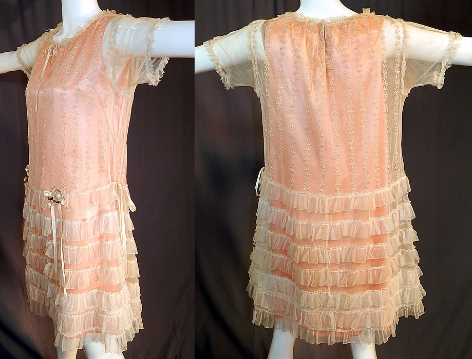 Vintage Embroidered Cream Net Lace Silk Ribbon Rosette Trim Peach Slip Dress
The dress measures 36 inches long, with 38 inch hips, a 38 inch waist and 36 inch bust. 