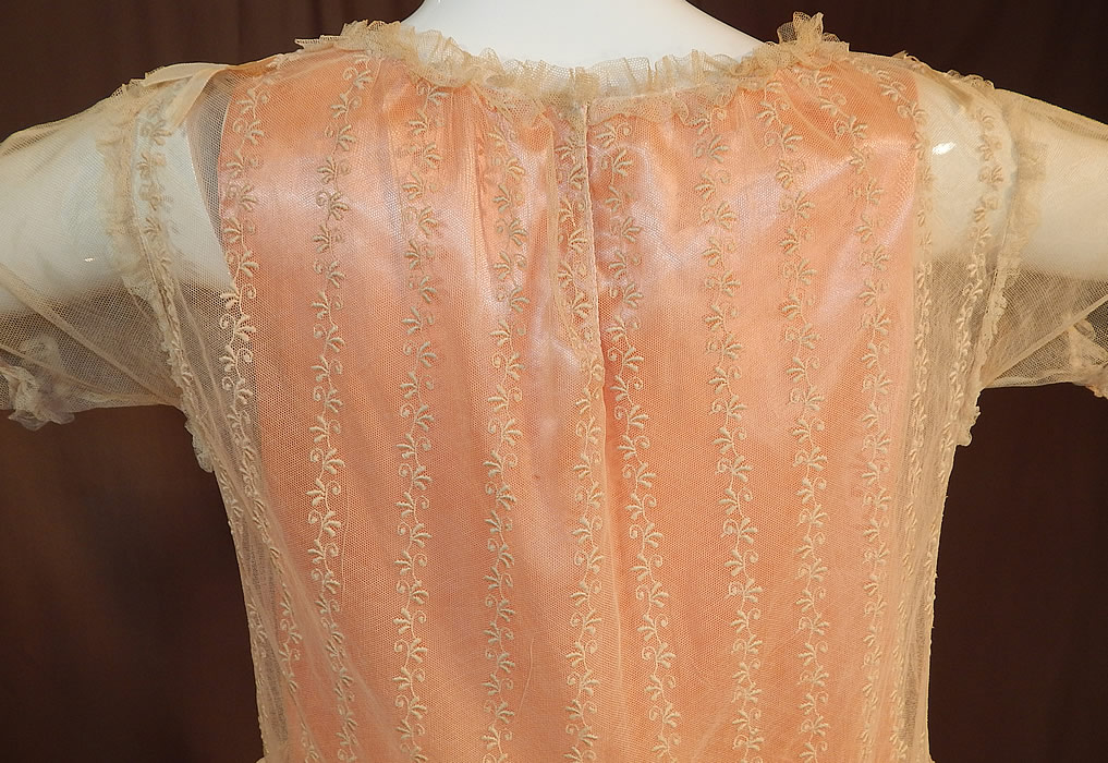 Vintage Embroidered Cream Net Lace Silk Ribbon Rosette Trim Peach Slip Dress
It is in excellent condition. This is truly a sweet piece of Lolita fashion, antique lace wearable art!