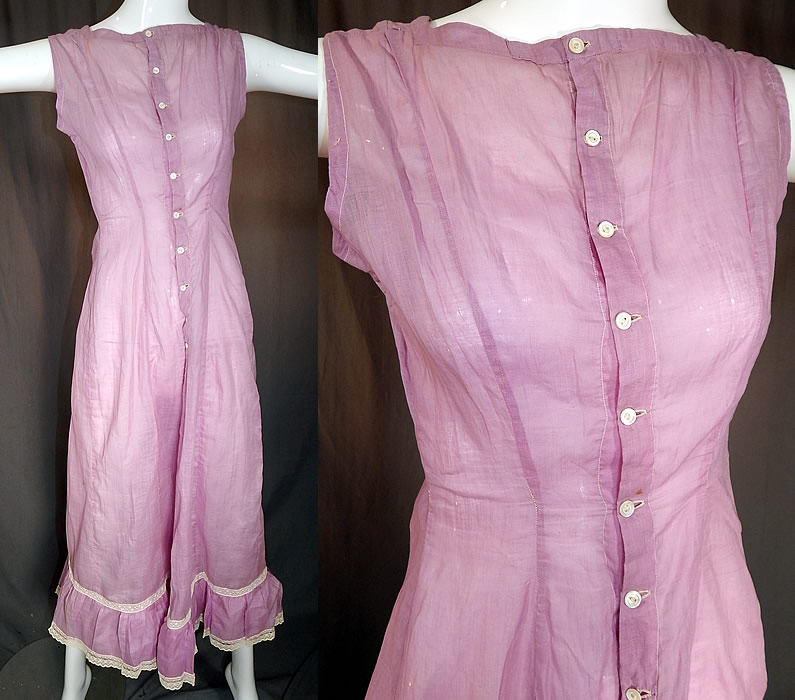 Edwardian Purple Lavender Cotton Batiste White Lace Trim Full Slip Dress
This antique Edwardian era purple lavender cotton batiste white lace trim full slip dress dates from 1910. It is made of a pale purple lavender color cotton batiste fabric, with white lace trim edging along the bottom skirt ruffle.