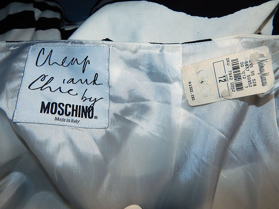 Vintage Cheap and Chic Moschino Black & White Zebra Stripe Blazer Suit Jacket Skirt NWT
It is in excellent unworn condition and still has the original Neiman Marcus department store price tags attached, $580 jacket and $150 skirt. This is truly a wonderful piece of quality made designer wearable art! 