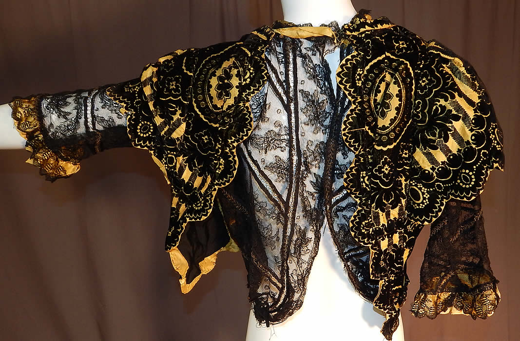 Victorian Yellow Silk Black Burnout Voided Velvet Devore Chantilly Lace Bodice
The top measures 16 inches long, with a 24 inch waist and 34 inch bust. 