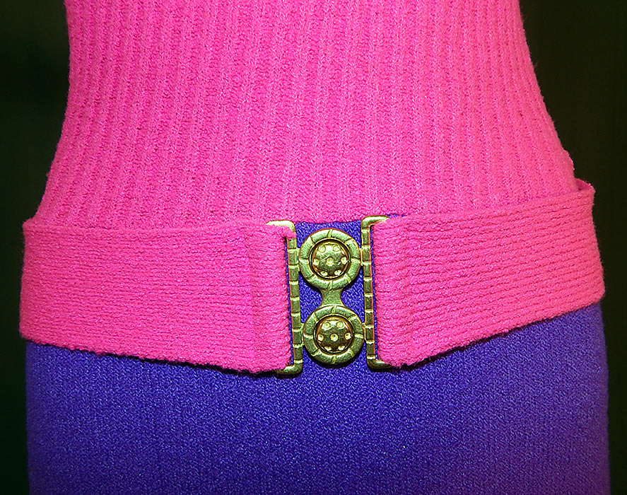 Vintage Kingston Knits by Cesia California Pink & Purple Knit Belted Mod Maxi Dress
This marvelous mod maxi dress is a long floor length, with a high side slit skirt, sleeveless, with a high turtle neck collar, form fitting top, drop waist with attached knit belt and gold metal buckle clasp, back zipper closure and is unlined. 
