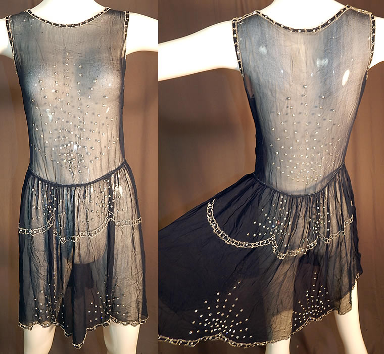 Vintage  Art Deco Navy Blue Sheer Silk Chiffon Rhinestone Beaded Flapper Dress
This vintage Art Deco navy blue sheer silk chiffon rhinestone beaded flapper dress dates from the 1920s. It is made of a navy blue sheer silk chiffon fabric with rhinestone, crystal beading.