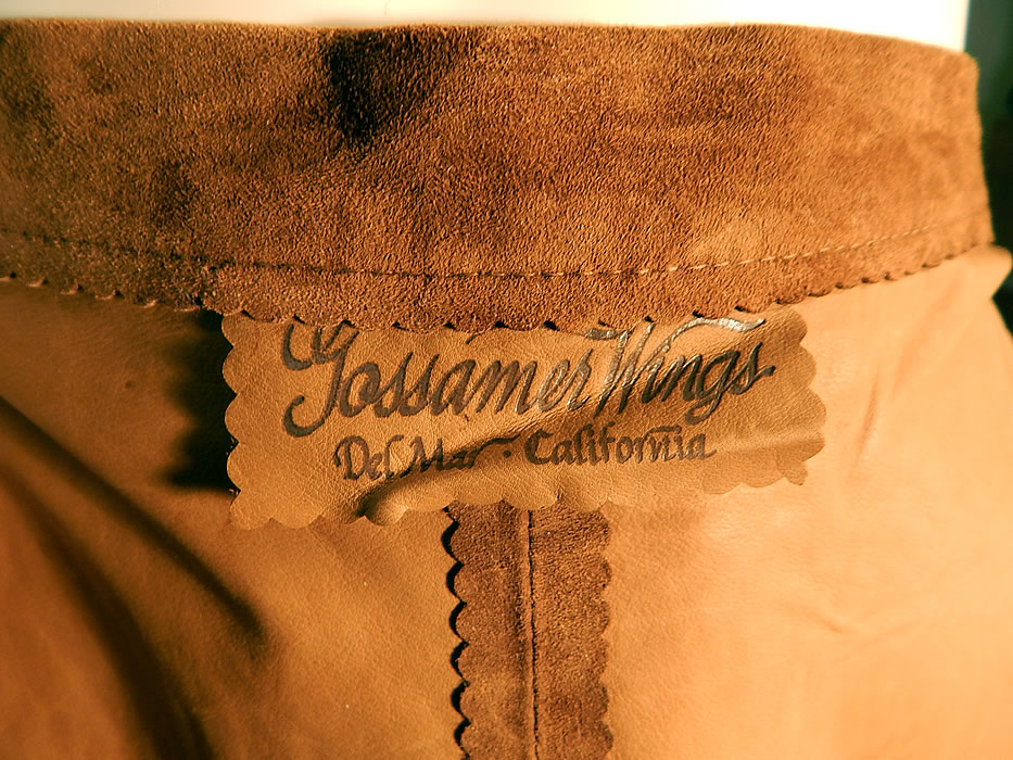 Vintage Gossamer Wings Brown Suede Leather Patchwork Dress Jacket Wrap Skirt
There is a "Gossamer Wings Del Mar, California" designer label sewn inside both garments. It is in excellent condition. This is truly a wonderful piece of unique leather wearable art! 