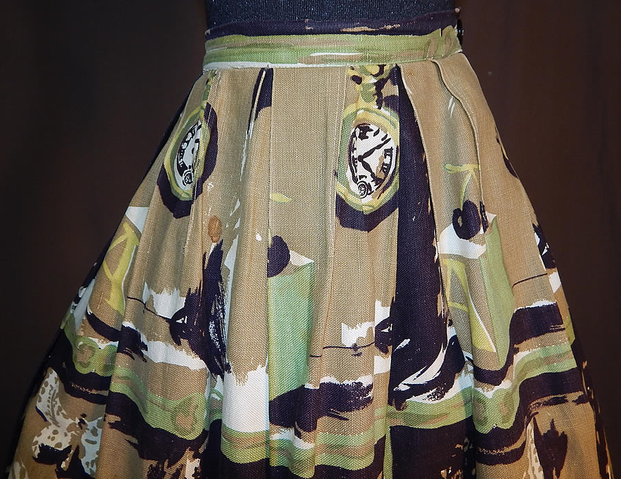 Vintage Century of Boston Cotton Twill Butterfly Artichoke Novelty Print Circle Skirt
It is made of heavy cotton twill woven fabric with varying shades of green, black and white done in a novelty print design of butterflies, artichokes, clocks, cherries, bee hives and hanging pears.