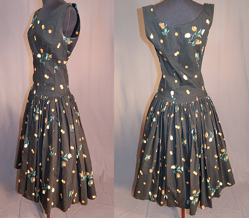 Vintage Black Cotton Polka Dot Tulip Novelty Print Fit & Flare Circle Skirt Dress
This retro summer sun dress has a fit and flare style, with a full circle skirt, fitted drop waist, sleeveless, rounded necklines, side zipper closure and is unlined.