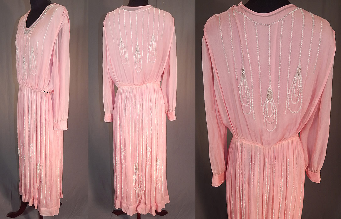 Vintage Pink Pastel Silk Chiffon Crystal Beaded Tear Drop Evening Gown Dress
This pretty pink evening gown dress is a long tea length with a fitted inside waistband, a beaded overlay blouse, long full sleeves with fitted cuffs, snap closures along the side top, skirt waistband and is fully lined with pink silk slip sewn inside. 