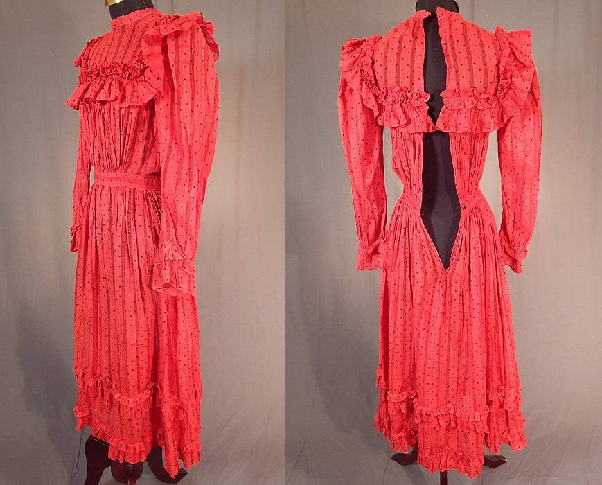Victorian Red Cotton Calico Black Polka Dot Ruffle Yoke Girls Youth Dress
The dress measures 46 inches long, with an 18 inch waist, 26 inch bust and 22 inch long sleeves. It is in excellent condition, missing only the back buttons and appears to have never been worn. 
