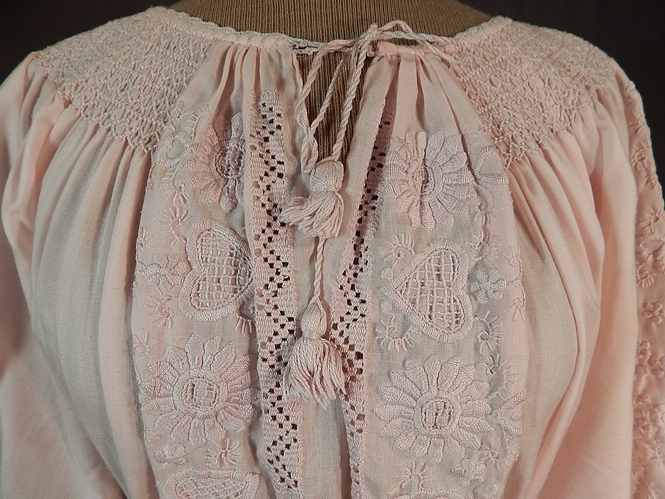 Vintage Pink Embroidered Hearts Flowers Smocking Boho Peasant Dress
It is made of a a pink pastel cotton polyester blend fabric, with pink raised padded satin stitch embroidery work of hearts, flowers, smocking stitching and crochet lace trim edging.