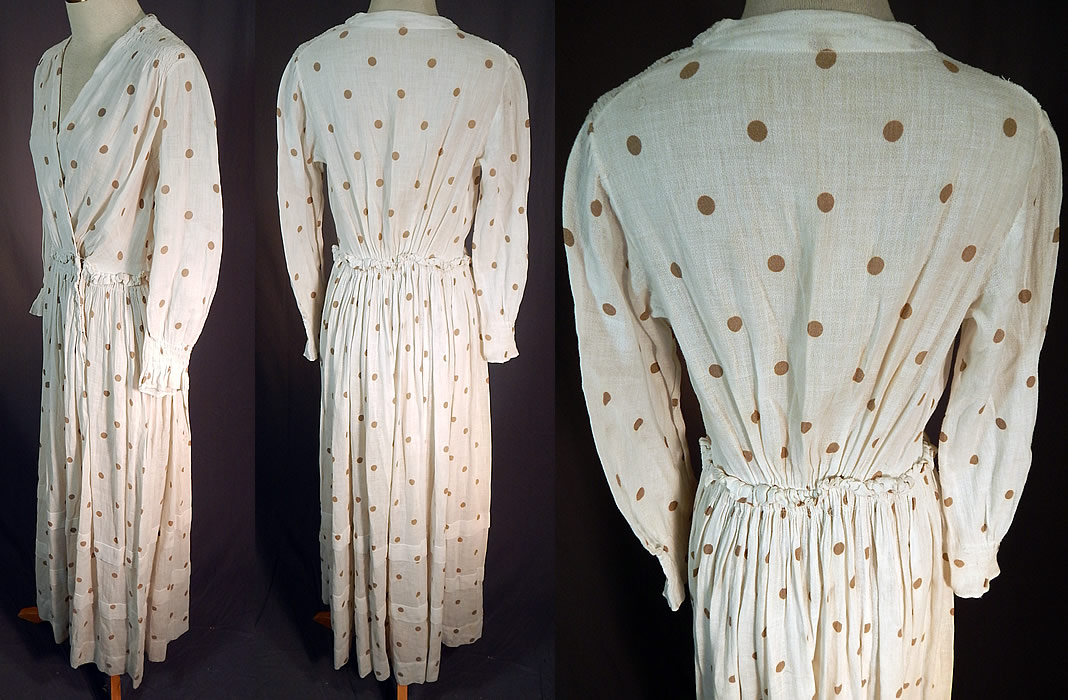 Edwardian White Cotton Muslin Brown Polka Dot Print Shoulder Smocking Dress
This whimsical womens workwear day dress has a fold over wrap neckline top with shoulder smocking, long full sleeves with smocked cuffs, a fitted waist with gathered ruffle trim, a long floor length skirt, snap closures on the front and is unlined. The dress measures 51 inches long, with a 22 inch waist, 34 inch bust and 20 inch long sleeves. 