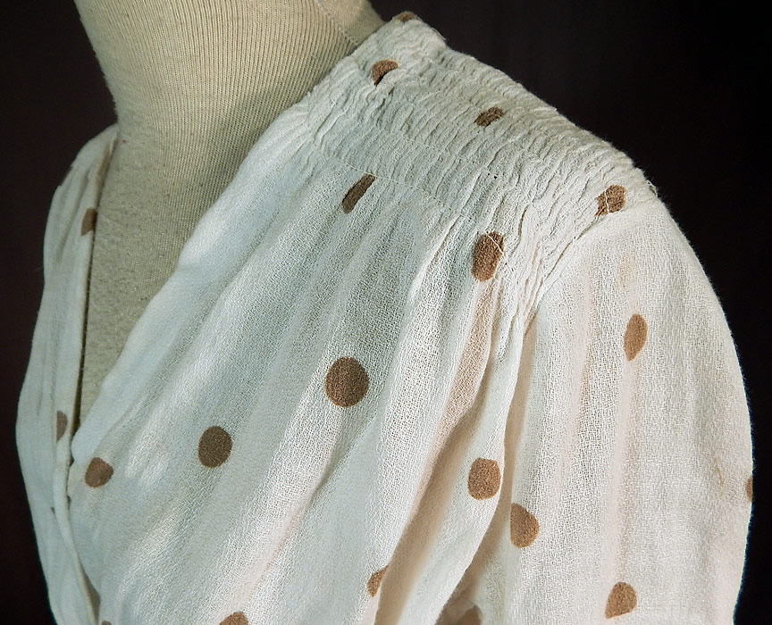 Edwardian White Cotton Muslin Brown Polka Dot Print Shoulder Smocking Dress
It is in good condition, but has not been cleaned, with a few faint small yellowing discoloration staining in areas which is barely noticeable. This is truly a wonderful piece of wearable art!