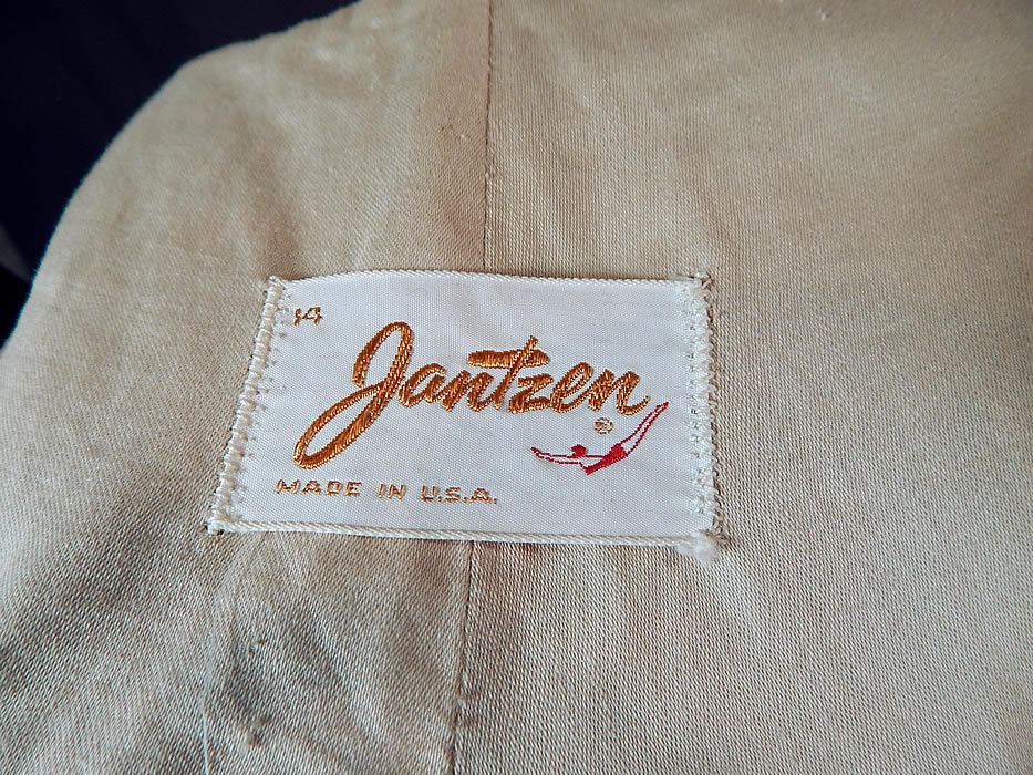 Vintage Jantzen Embroidered Ecru Linen Lace Trim Pinup Romper Swimsuit
There is a "Jantzen" label, size 14 tag sewn inside. The swimsuit measure 29 inches long, with 34 inch hips, a 24 inch waist and 34 inch bust. It is in excellent condition. This is truly a wonderful piece of wearable retro swimwear textile art!