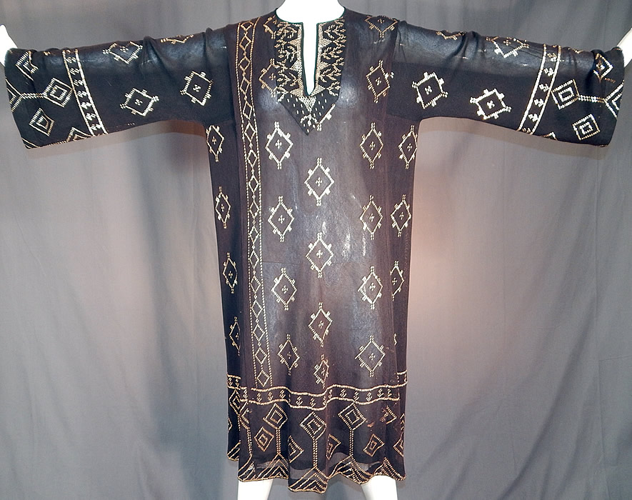 Vintage Art Deco Egyptian Assuit Shawl Black Net Silver Studded Kaftan Dress
This amazing antique Art Deco Egyptian Assuit shawl black net silver studded kaftan dress dates from the 1920s. 