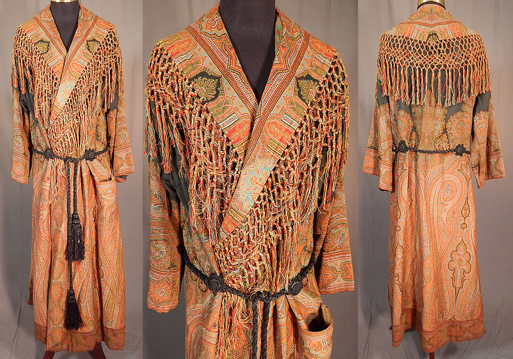 Victorian Antique Wool Paisley Shawl Collar Belted Robe Morning Dressing Gown
This Victorian era antique wool paisley shawl collar belted robe morning dressing gown dates from the 1880s. It is made of jacquard hand loomed woven wool done in strong bright vivid vibrant autumn fall colors, with the black wool centered and pieced on the top.