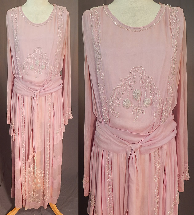 Edwardian Lilac Silk Chiffon Crystal Beaded Belted Evening Gown Dress
This vintage Edwardian era lilac silk chiffon crystal beaded belted evening gown dress dates from 1918. It is made of a light purple pinkish lilac color sheer silk chiffon fabric with crystal beading done in decorative designs.
