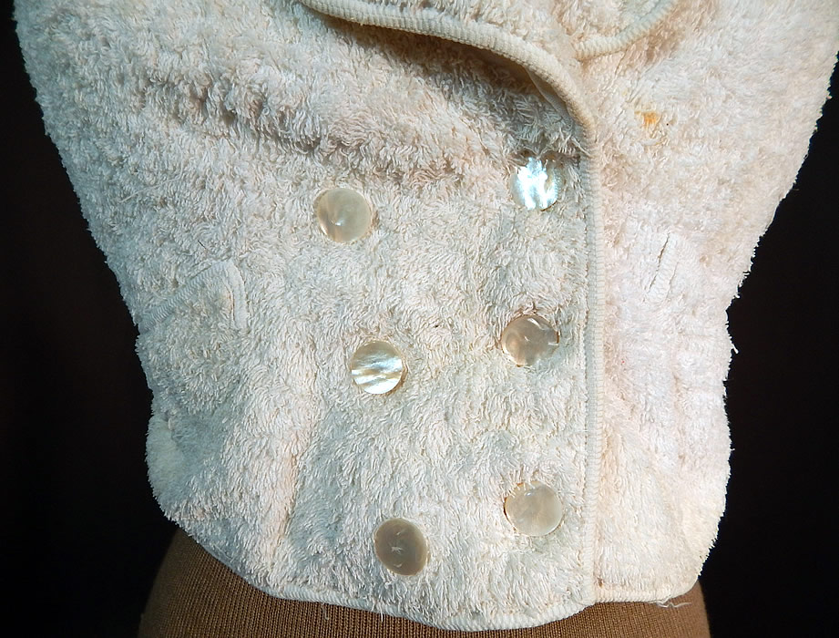Victorian White Cotton French Towell Terry Cloth Double Breasted Waistcoat Vest
This unusual dapper gentleman's waistcoat vest is double breasted with mother of pearl button closures, a fold over lapel collar, three front slit pockets and is fully lined. 