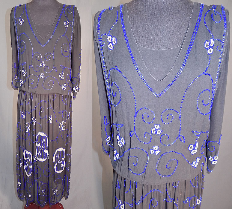 Vintage Art Deco Black Silk Pink & Cobalt Blue Beaded Spiral Floral Flapper Dress
This amazing Art Deco vintage black silk, pink and cobalt blue beaded spiral floral flapper dress dates from the 1920s. It is made of a sheer black silk chiffon fabric, with a pale pastel pink and bright cobalt blue beading done in Art Deco abstract floral vine leaf spiral designs