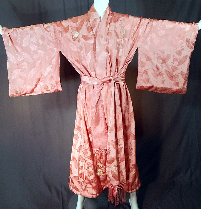 Vintage Japanese Pink Silk Damask Fan Floral Embroidered Mon Belted Kimono Robe
This vintage Japanese pink silk damask fan floral embroidered mon belted kimono robe dates from the 1920s. 