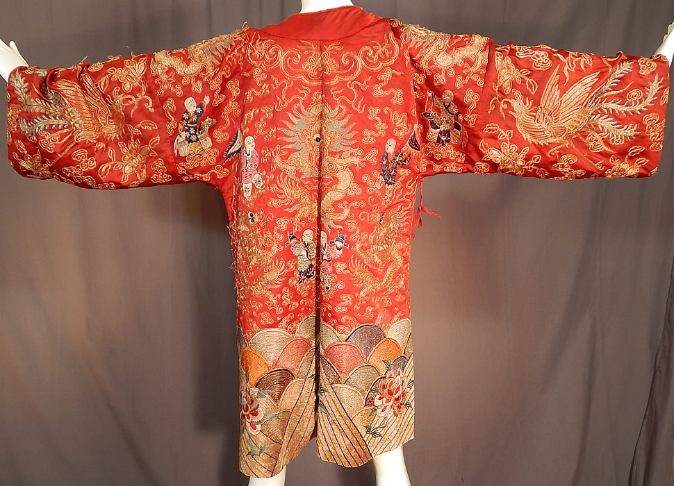 Antique Chinese Dragon Phoenix Gold Couching Embroidery Red Silk Opera Robe
There are Chinese figural people colorfully embroidered on both the front and back carrying various objects, fish and riding ponies.