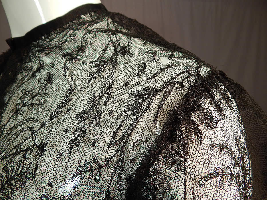 Victorian Antique Black Chantilly Lace Shawl Jacket Leg of Mutton Gigot Sleeve
The jacket measures 21 inches long, with a 36 inch bust, 25 inch long sleeves and is 14 inches across the top shoulder seam. 