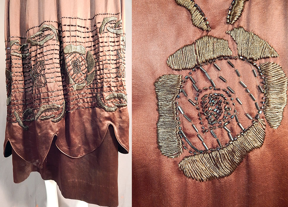 Vintage Art Deco Brown Silk Embroidered Bronze Beaded Flapper Dress Evening Gown
This fabulous flapper dress evening gown has a loose fitting drop waist style, with a layered overblouse top, long under sleeves attached to an inside camisole lining, a layered over skirt with scalloped bottom, an asymmetrical wrap with back drape panel skirt, snaps along the shoulders, waist, front side and is lined on the top only with a white silk camisole hook front closures. 