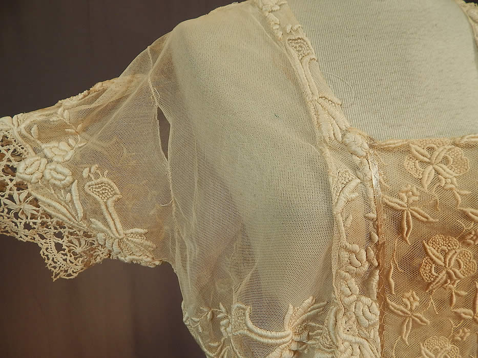 Vintage Cream Tulle Net French Knot Embroidered Floral Lace Drop Waist Dress
There are a few faint small stains, tiny pin holes on the back top, loose stitching around the waist, small open seams under the arms and a small frayed hole at the front waist hidden underneath the lace trim panel (see close-ups). This is truly a wonderful piece of wearable lace art!