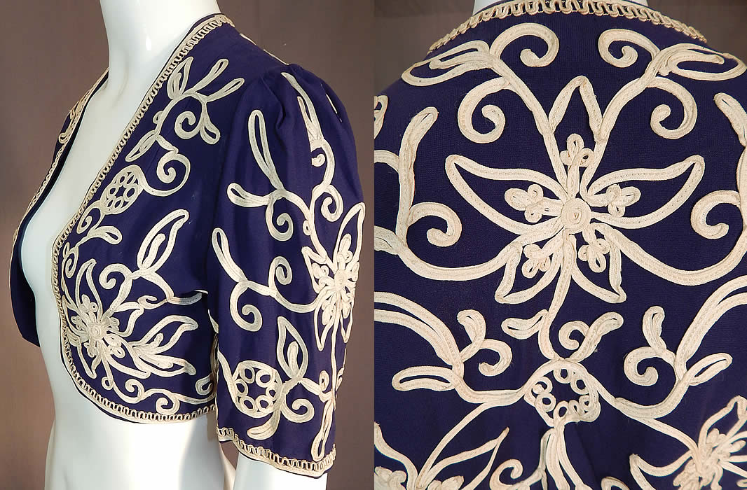 Vintage Irene Kay Navy Blue Silk Crepe Cream Soutache Shrug Bolero Jacket
This vintage Irene Kay navy blue silk crepe cream soutache shrug bolero jacket dates from the 1940s. It is made of a navy blue silk crepe de chine fabric, with cream color silk braid soutache appliqu&eacute; work done in a floral spiral design.