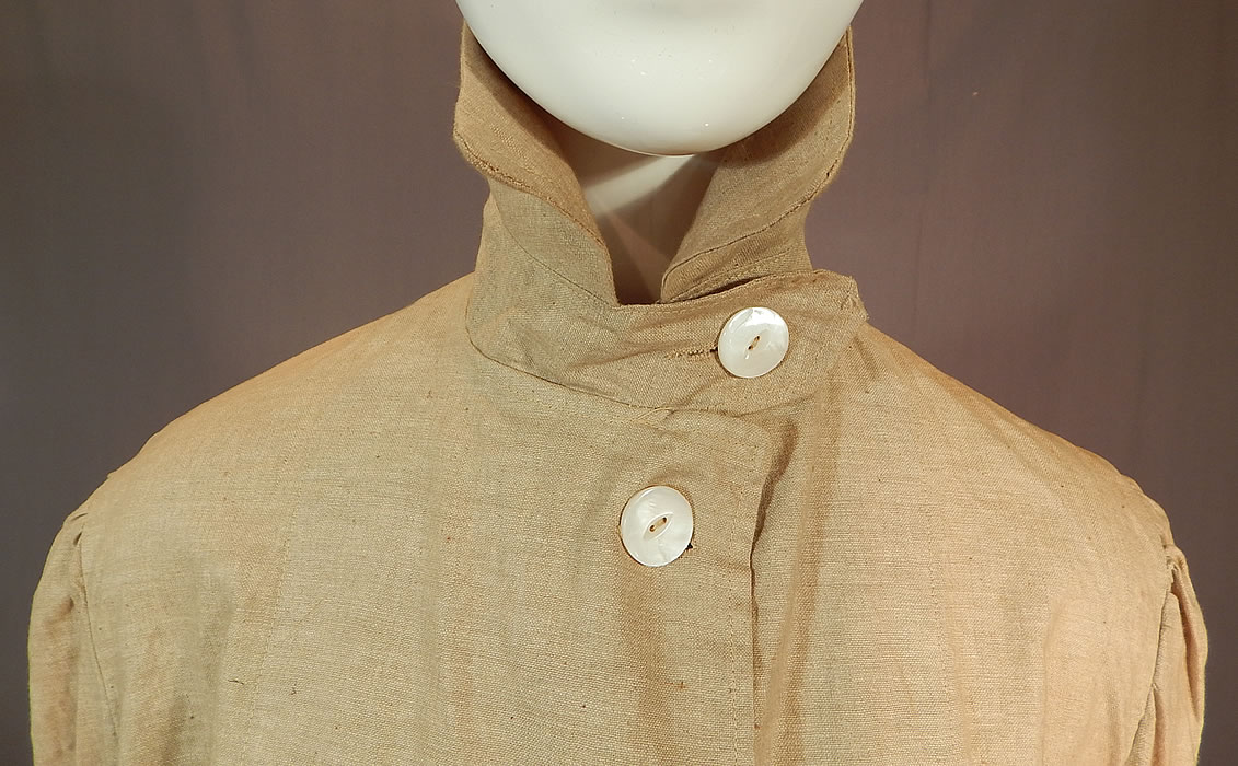 Edwardian Women's Linen Travel Motoring Driving Duster Coat Jacket
This coat would have been worn to protect ones clothing from the dust and mud when traveling, riding and driving in a motor car. It is in good as-is condition, but has not been cleaned with some faint small stains along the bottom and a scattering of tiny age spots foxing. This is truly a wonderful piece of wearable early motoring horseless carriage textile art!