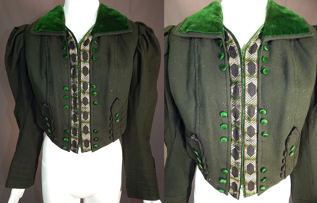 Victorian Dark Green Wool Velvet Trim Short Crop Coat Bolero Jacket
This vintage Victorian era dark green wool velvet trim short crop coat bolero spencer jacket dates from 1900. It is made of a dark green color wool fabric, with a forest green velvet collar, button trim accents and woven silk damask weave brocade ribbon trim front opening.