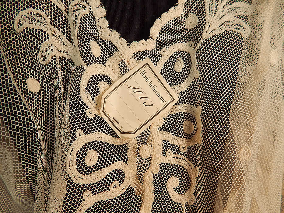 Vintage Germany Cream Tulle Net Tambour Embroidery Lace Unused Dress Fabric
There is a "Made in Germany" original paper tag still attached on back. It is in excellent condition, never used and just needs to be sewn up the back with added closures. This is truly a rare and wonderful piece of wearable German lace art!