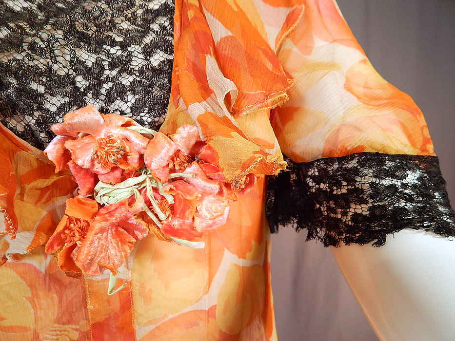 Vintage Floral Orange Blossom Print Silk Chiffon Black Lace Handkerchief Skirt Dress
It is made of a bright orange and off white floral orange blossom flower print sheer silk chiffon fabric, with black lace trim edging the sleeve cuffs, skirt hemline and front yoke top. 