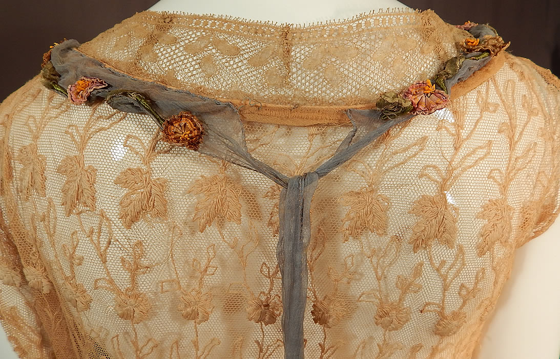 Vintage Cream Tambour Embroidery Lace Silk Rosette Drop Waist Dress
The dress measures 49 inches long, with a 32 inch bust and 32 inch waist. It is in fair as-is condition, has not been cleaned, slightly dingy, with some faint discoloration on the net lace top and several small frayed holes weak areas in the ecru cream silk chiffon fabric inside lining the skirt. This is truly a rare, feminine, delicate piece of wearable lace, rosette art which would be great for design inspiration!