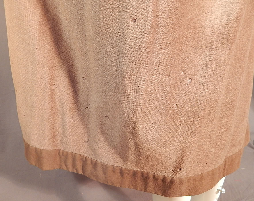 Vintage Art Deco Khaki Brown Mohair Wool Winter Shawl Collar Cloak Cape
It is in fair as-is condition, with several small holes and moth nips scattered throughout the wool mohair fabrics and some fraying along the inside silk lining the neck (see close-ups). This is truly a wonderful piece of Art Deco wearable art!