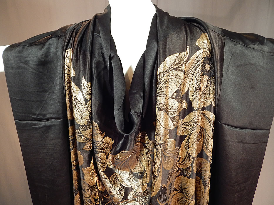 Vintage Art Deco Black Silk Gold Lam&eacute; Lame Flapper Cloak Cape Shawl Scarf
It is made of a black silk woven gold metallic lam&eacute; thread damask fabric with a reversible lush floral leaf pattern design. 