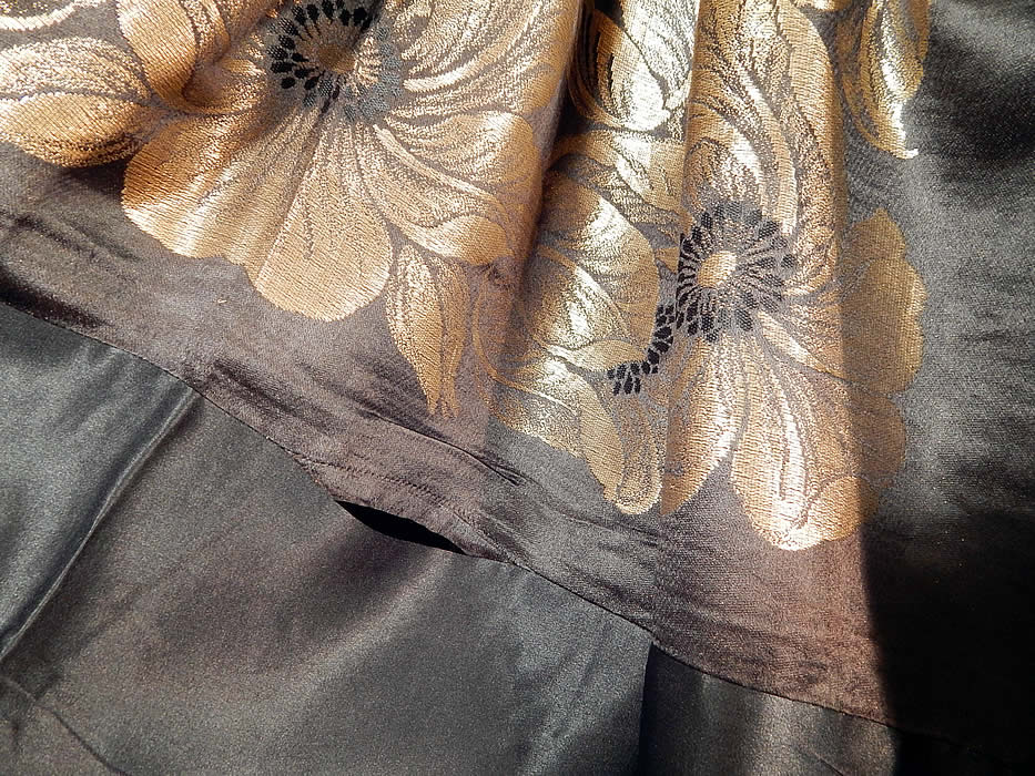 Vintage Art Deco Black Silk Gold Lam&eacute; Lame Flapper Cloak Cape Shawl Scarf
It is in good condition, with only some small slight faint tarnish discoloration in areas and a small open seam along the edging trim (see close-up). This is truly a wonderful piece of wearable Art Deco textile art!