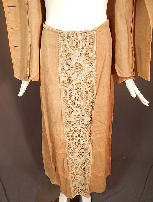 Edwardian Ecru Beige Linen Cream Cluny Lace Walking Suit Jacket Skirt
There is a matching fabric long floor length skirt, with a lace trim front, pleating, hook closures on the back and is unlined. 