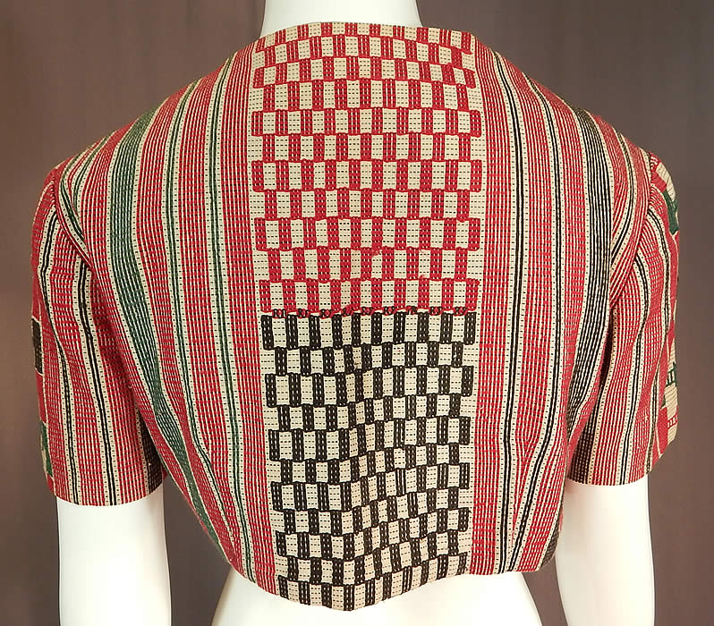 Vintage Ethnic Embroidered Woven Red Short Cropped Boho Bolero Jacket Shrug
The jacket measures 13 inches long, with a 36 inch bust and is 15 inches across the back shoulders seam. It is in excellent condition. This is truly a wonderful piece of boho wearable art!